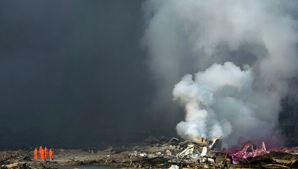 Последствия взрывов на складе опасных веществ в промышленном городе Тяньцзин, Китай. Архивное фото