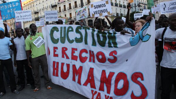 Акция протеста в связи с гибелью иммигранта в центре Мадрида