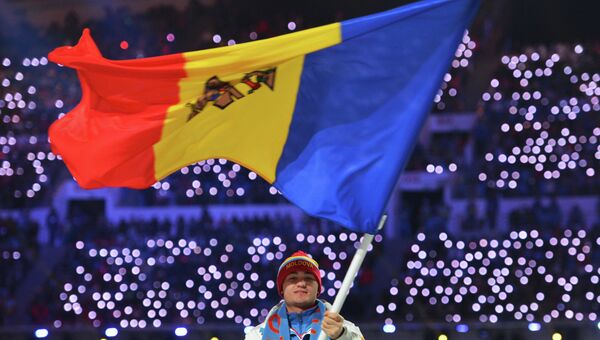Знаменосец сборной Молдавии на церемонии открытия XXII зимних Олимпийских игр в Сочи