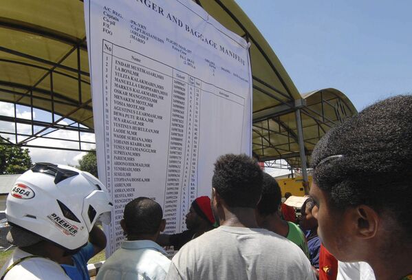 Списки пассажиров самолета Тригана Эйр в аэропорту Джаяпура, Индонезия
