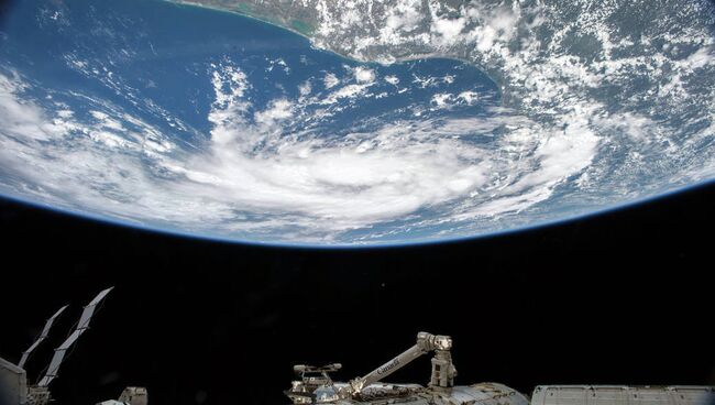 Тропический шторм в Мексиканском заливе с борта МКС. Архивное фото