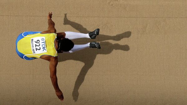 Шведский спортсмен Мишель Торнеус во время соревнований по прыжкам в длину на ЧМ по легкой атлетике в Пекине, Китай