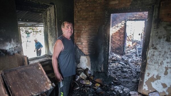 Последствия обстрела поселка Александровка в Донецкой области. Архивное фото