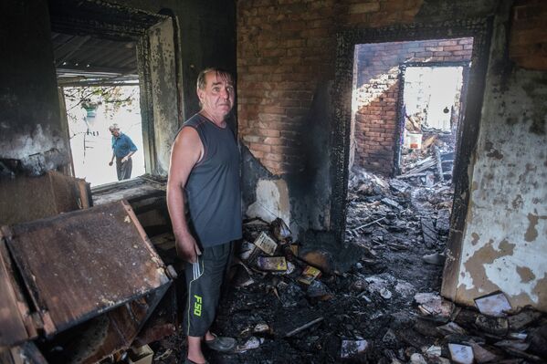 Последствия обстрела поселка Александровка в Донецкой области