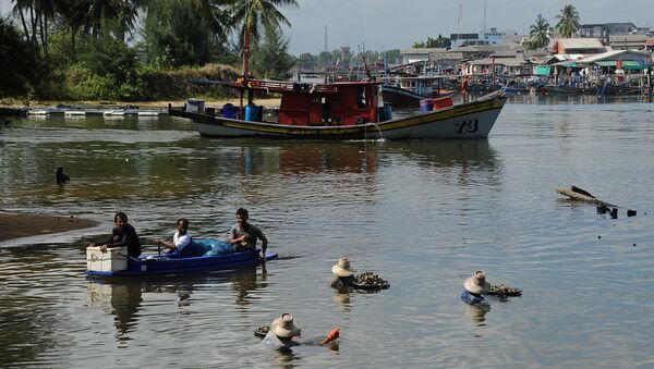 Тайские рыбаки на юге Таиланда. 2014 год