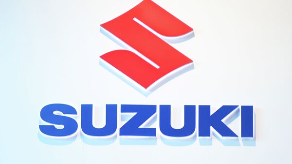 Эмблема Suzuki.