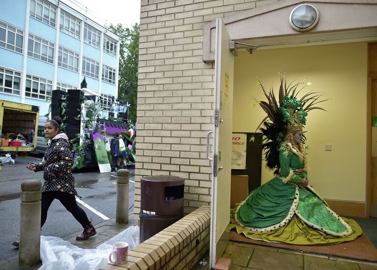 Участница парада Notting Hill Carnival в западном Лондоне. Август 2015