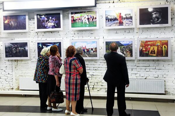 Традиционно в главный профессиональный праздник в Ленинске-Кузнецком открыта фотовыставка, посвященная шахтерам