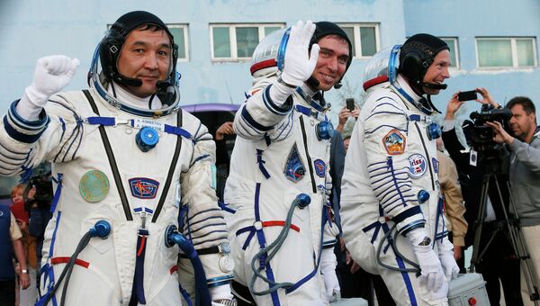 Участники 45/46-й длительной экспедиции на Международную космическую станцию. Архивное фото