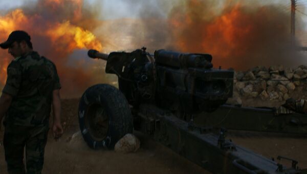 Сирийские военные ведут обстрел позиций исламистов в окрестностях города Эз-Забадани, Сирия