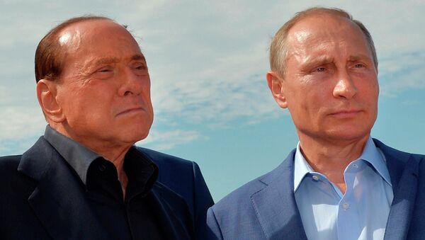 Президент России Владимир Путин и экс-председатель Совета министров Италии Сильвио Берлускони. Архивное фото