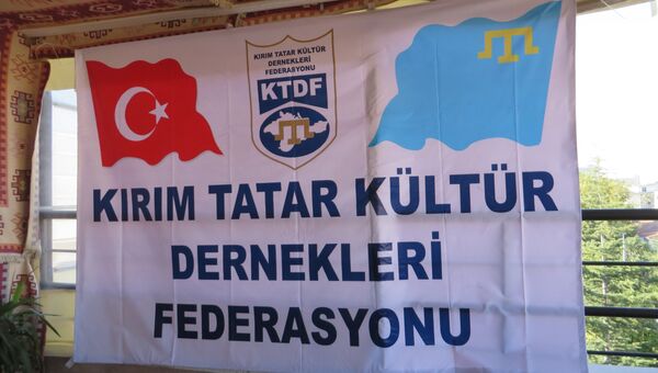 Плакат на конференции крымских татар в Турции