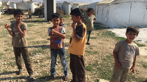 Сирийские дети в лагере беженцев в долине Бекаа