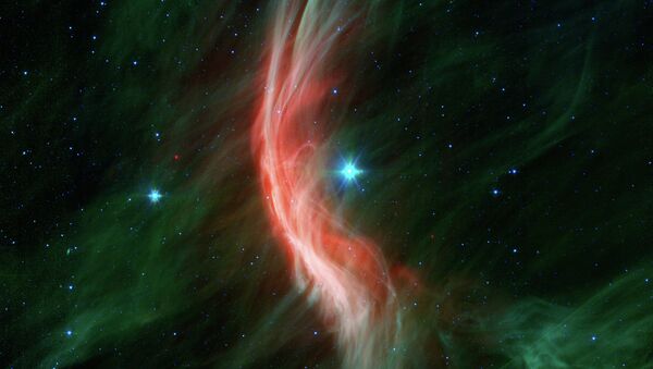 Фотография сверхзвукового хлопка, порождаемого звездой, телескоп Спитцер