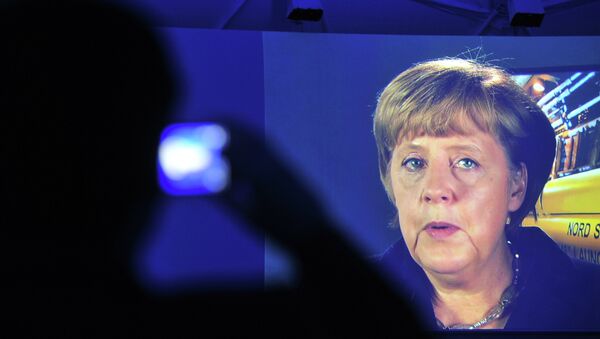 Канцлер Германии Ангела Меркель во время телемоста