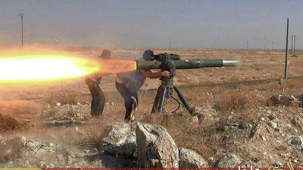 Боевики Исламского государства во время боя в районе города Хасеке на северо-востоке Сирии. Архивное фото