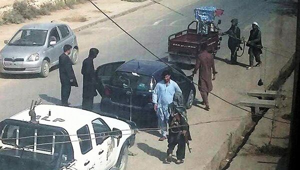 Боевики Талибана на улице в Кундузе, Афганистан