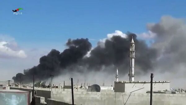 Последствия авиаудара по пригороду Хомса, Сирия