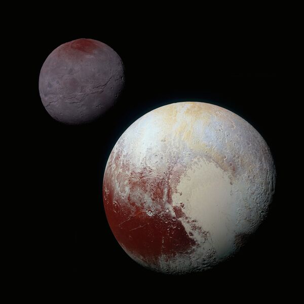 Цветная фотография Плутона и Харона
