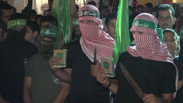 Вооруженные ножами палестинцы митинговали против израильской полиции в Газе