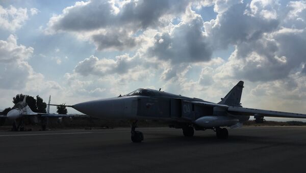Российские самолеты готовятся к вылету на авиабазе Хмеймим в Сирии