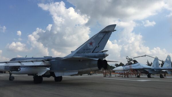 Российские самолеты готовятся к вылету на авиабазе Хмеймим в Сирии