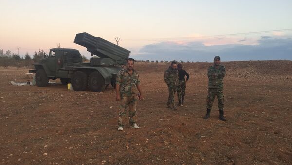 Бойцы сирийской армии на севере провинции Хама. Архивное фото