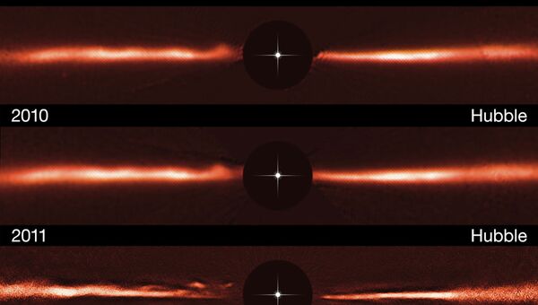 Снимки с Хаббла и VLT, указавшие на существование волн в протопланетном диске