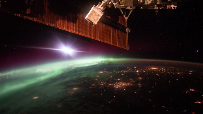 Фотография полярного сияния, сделанная с борта Международной космической станции. Архивное фото