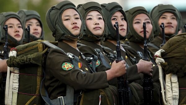 Участницы парада, посвященного 70-летию Трудовой партии Кореи, в Пхеньяне, КНДР