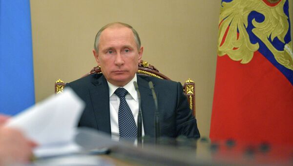 Президент РФ В.Путин. Архивное фото