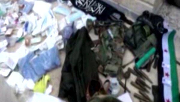 Сирийские военные показали захваченные у террористов трофеи в Тель-Скеке