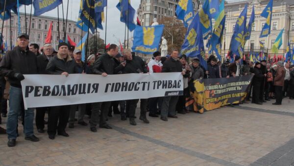 Националисты с портретами Бандеры прошли по Киеву в годовщину создания УПА