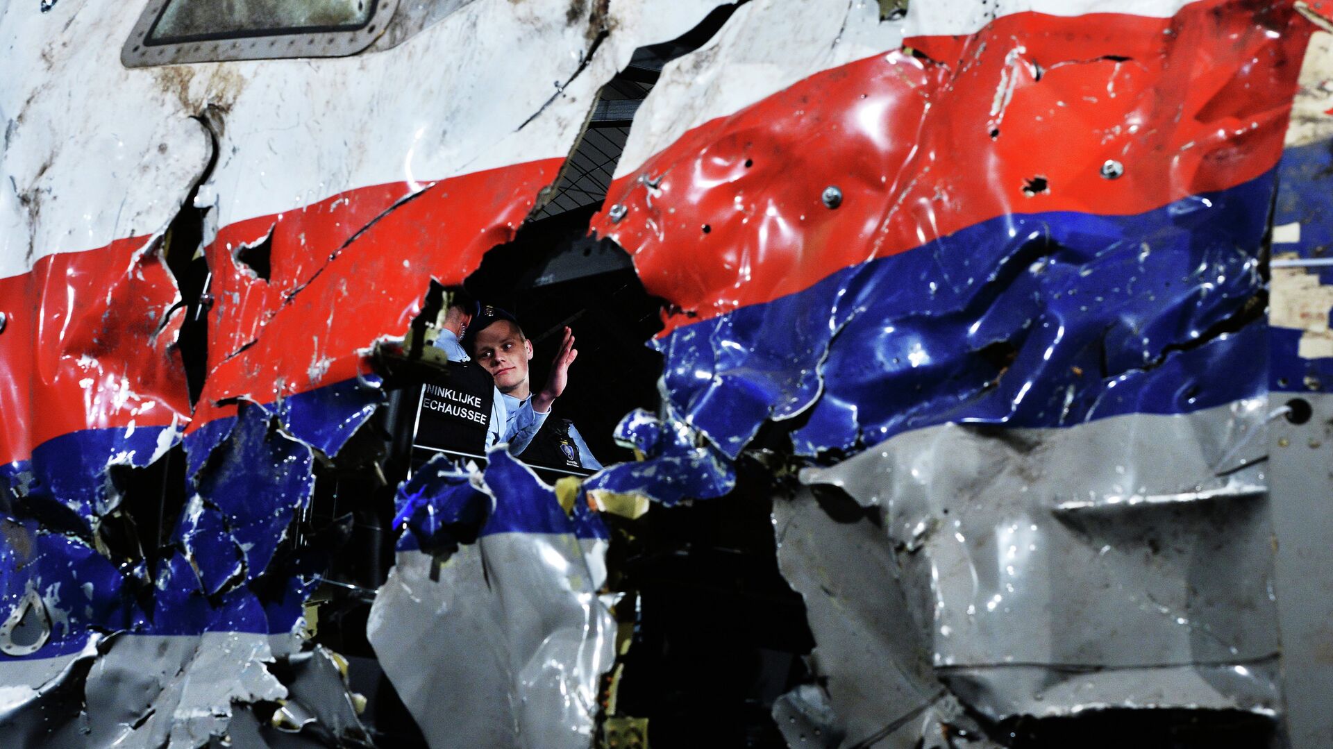 Представление доклада об обстоятельствах крушения лайнера Boeing 777 Malaysia Airlines (рейс MH17) на Востоке Украины 17 июля 2014 года на военной базе Гилзе-Рейен в Нидерландах - РИА Новости, 1920, 26.01.2022