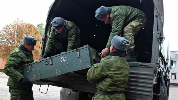 Отвод вооружений калибра менее 100 мм от линии соприкосновения в Луганской области. Архивное фото