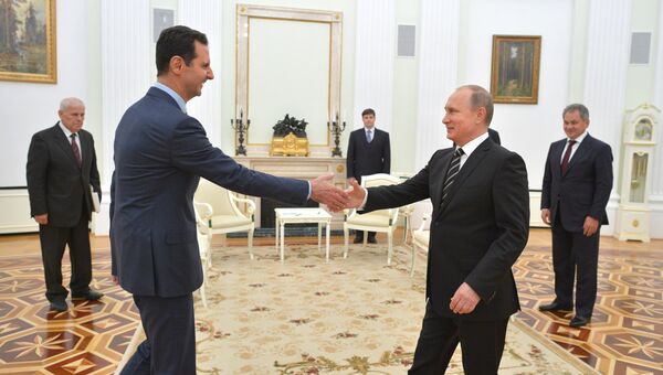 Президент России Владимир Путин и президент Сирии Башар Асад. Архивное фото