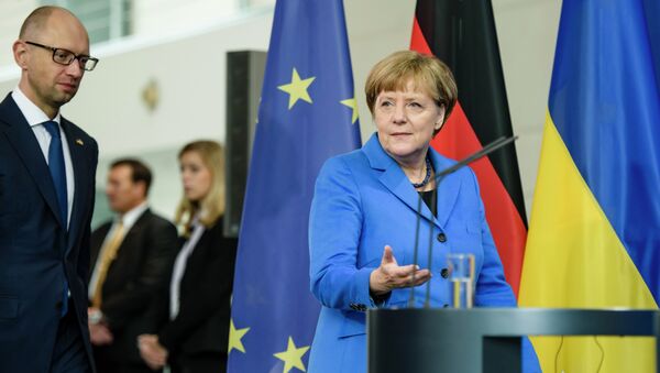Канцлер Германии Ангела Меркель и премьер-министр Украины Арсений Яценюк во время пресс-конференции в Берлине