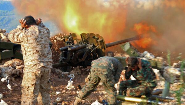 Военнослужащие сирийской армии в районе поселения Сальма в сирийской провинции Латакия