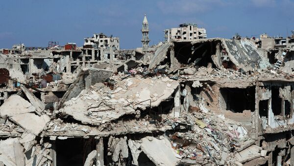 Разрушенные жилые дома в Сирии. Архивное фото