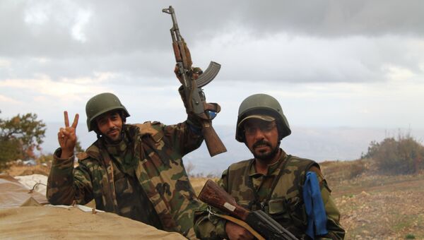 Сирийская армия и бойцы народного ополчения в горной гряде Джиб Аль-Ахмар. Архивное фото