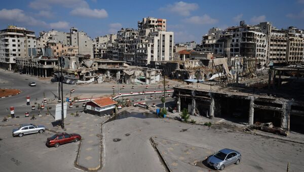 Разрушенные здания в сирийском городе Хомс. Архивное фото
