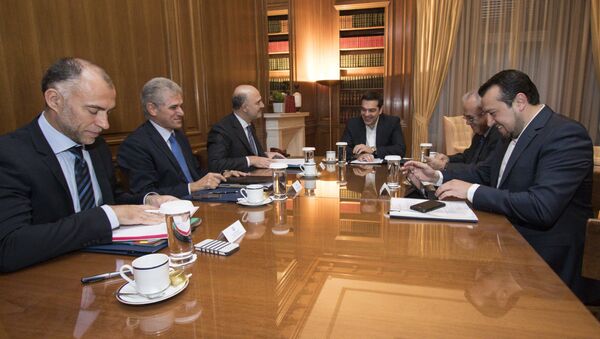Встреча премьер-министра Греции Ципраса и еврокомиссара Московиси
