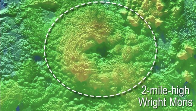 Предположительные вулканы на поверхности Плутона, расположенные на равнине Спутника Предположительные вулканы на поверхности Плутона, расположенные на равнине Спутника