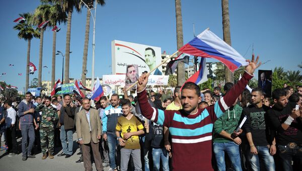 Митинг в поддержку российской военной операции в городе Тартус (Сирия)