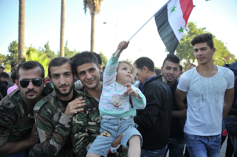 Митинг в поддержку российской военной операции в городе Тартус, Сирия Митинг в поддержку российской военной операции в городе Тартус, Сирия