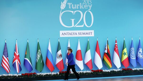 Канцлер Германии направляется на церемонию открытия саммита G20