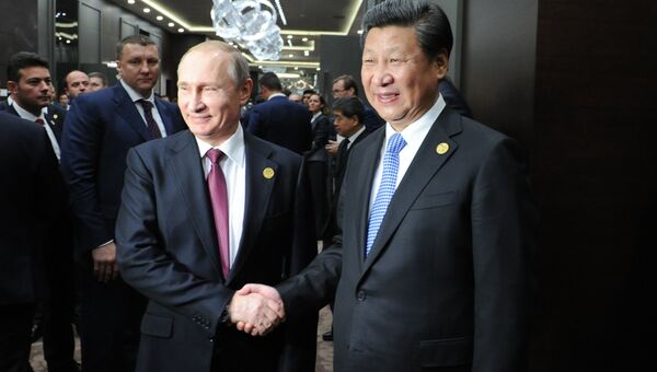 Владимир Путин и Си Цзиньпин во время встречи на полях саммита Группы двадцати (G20), архивное фото