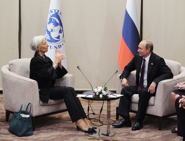 Президент России Владимир Путин и директор-распорядитель Международного валютного фонда (МВФ) Кристин Лагард во время встречи на полях саммита Группы двадцати (G20)