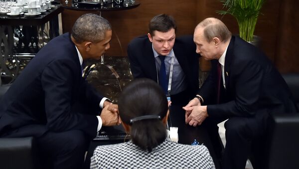 Президент России Владимир Путин во время беседы с президентом США Бараком Обамой на полях саммита Группы двадцати (G20). Архивное фото