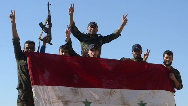 Солдаты Сирийской Арабской Армии (САА) на авиабазе Квейрис в Сирии. Архивное фото